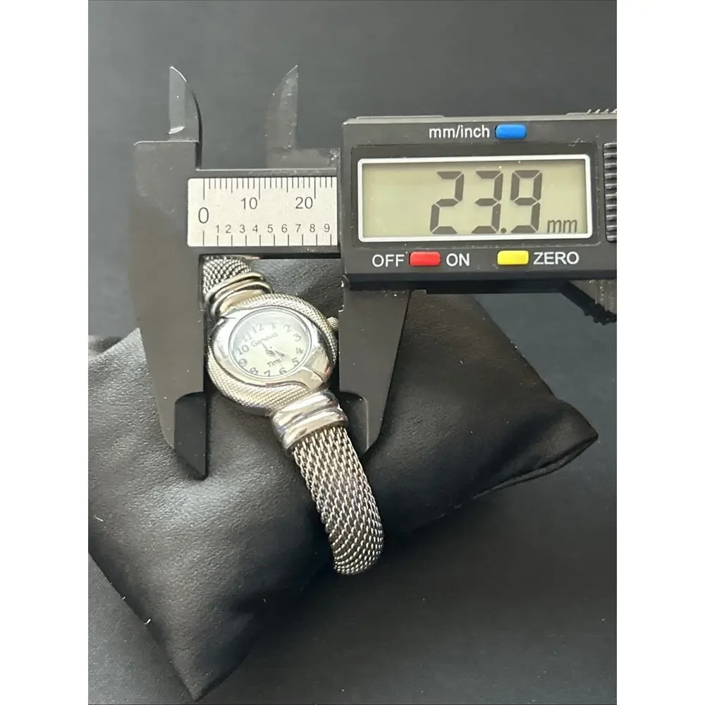 Geneva Silver Tone Women’s Cuff Watch